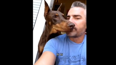 The dog named Ruby with her human as they record a video.&nbsp; (Instagram/@rubydooby_do)