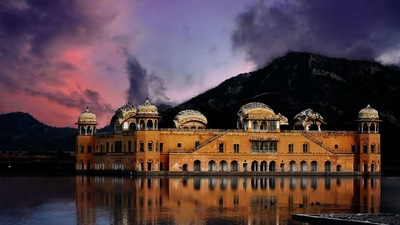 Visit Jal Mahal: Jal Mahal, also known as 'Water Palace,' is an old infrastructure that was built in Rajput architectural style. This five-storied building stands in the middle of the beautiful Man Sagar Lake. (Unsplash) Visit Jal Mahal: Jal Mahal, also known as 'Water Palace,' is an old infrastructure that was built in Rajput architectural style. This five-storied building stands in the middle of the beautiful Man Sagar Lake. (Unsplash)