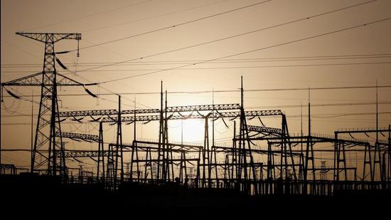 Electricity pylons and power lines are pictured at a power station near Yumen, Gansu province, China. An acute electricity shortage has rocked the country. (REUTERS)