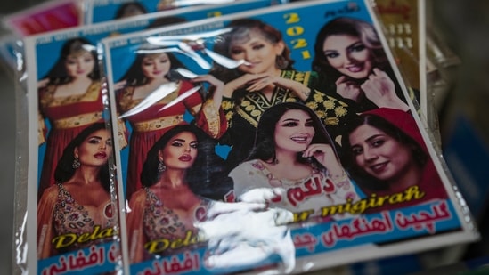 DVDs of Afghan singers sit in a shop in Kabul, on September 18. Aryana Sayeed, a top female pop star who was also a judge on the TV talent show, “The Voice of Afghanistan,” managed to already leave the country. Already used to death threats by Islamic hard-liners, Sayeed decided to escape the day after the Taliban took over Kabul.(Bernat Armangue / AP)