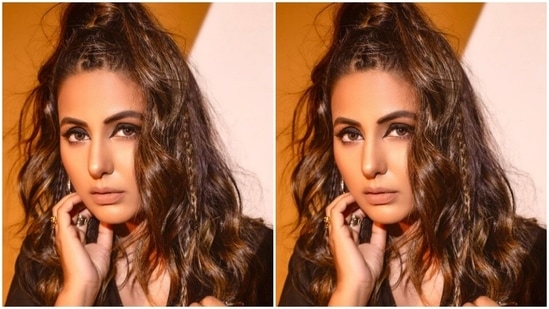 The hair plays a vital part in this photoshoot as her voluminous tresses did all the talking. Hina partly tied them in a top knot and let half fall free from her back. The mini braids on top of the hairdo added an edgy twist. Well, she surely stole the show.(Instagram/@realhinakhan)