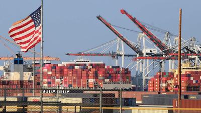 A US flag flies near containers stacked high on a cargo ship at the Port of Los Angeles on Tuesday. Indian commerce minister Piyush Goyal has proposed an ambitious target of $1 trillion for India-US bilateral trade over the next 10 years. (AFP) A US flag flies near containers stacked high on a cargo ship at the Port of Los Angeles on Tuesday. Indian commerce minister Piyush Goyal has proposed an ambitious target of $1 trillion for India-US bilateral trade over the next 10 years. (AFP)