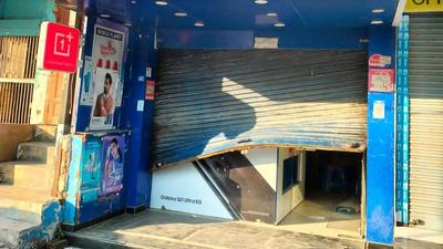 A view of one of the stores that was robbed in Navyug Market in Ghaziabad. A PCR van was on night duty and crossed the two shops at least 10 minutes before the thieves arrived. (Sakib Ali/HT Photo) A view of one of the stores that was robbed in Navyug Market in Ghaziabad. A PCR van was on night duty and crossed the two shops at least 10 minutes before the thieves arrived. (Sakib Ali/HT Photo)