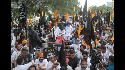 Shiromani Akali Dal president Sukhbir Singh Badal leading a tractor march in Mohali towards Punjab CM’s residence in protest against inadequate land compensation for farmers.