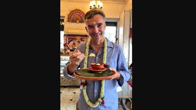 British High Commissioner Alex Ellis enjoying rasgulla. (Twitter/@AlexWEllis)