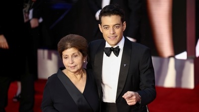 Nelly Malek and actor Rami Malek pose as they arrive at the world premiere of the new James Bond film No Time To Die at the Royal Albert Hall in London. (REUTERS)