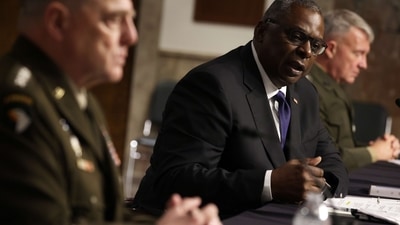 L-R: Chairman of the US joint chiefs of staff Mark Milley, defence secretary Lloyd Austin and Central Command chief Kenneth McKenzie testify during a hearing in Washington, DC. (AFP) L-R: Chairman of the US joint chiefs of staff Mark Milley, defence secretary Lloyd Austin and Central Command chief Kenneth McKenzie testify during a hearing in Washington, DC. (AFP)