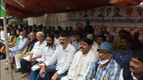 Members of Non-National Democratic Alliance (NDA) parties take part in the day-long sit-in protest outside Raj Bhawan in Ranchi on Wednesday. (HT PHOTO)