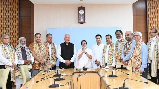Luizinho Faleiro with West Bengal chief minister Mamata Banerjee and senior Trinamool Congress leaders in Kolkata on Wednesday. (HT photo / Samir Jana)