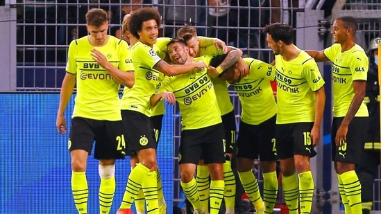 Champions League - Group C - Borussia Dortmund v Sporting Lisbon - Signal Iduna Park, Dortmund, Germany - September 28, 2021 Borussia Dortmund's Donyell Malen celebrates scoring their first goal with teammates(REUTERS)