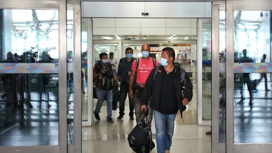 Indians evacuated from Afghanistan after Taliban takeover, arrive at the IGI airport on August 22. HT photo