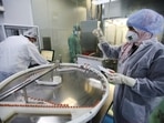A lab technician holds a vial of Chinese Sinovac's CoronaVac vaccine against coronavirus disease (Covid-19) in Constantine, Algeria, on September 29, 2021.&nbsp;