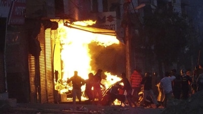 Among the 21 accused in the larger conspiracy case are former JNU student union leader Umar Khalid and former councillor Tahir Hussain, who have been booked under the stringent UAPA for allegedly conspiring to orchestrate the riots in February 2020. (AP) Among the 21 accused in the larger conspiracy case are former JNU student union leader Umar Khalid and former councillor Tahir Hussain, who have been booked under the stringent UAPA for allegedly conspiring to orchestrate the riots in February 2020. (AP)