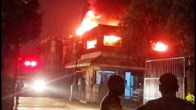 Fire department officials were informed that sparks from electrical wires had resulted in the building, located in Sector 3 of Manesar, catching fire at 3.21am. Fire department officials were informed that sparks from electrical wires had resulted in the building, located in Sector 3 of Manesar, catching fire at 3.21am.