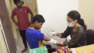 A boy gets tested for malaria at the MMG Hospital in Ghaziabad on Thursday. (Sakib Ali/HT Photo) A boy gets tested for malaria at the MMG Hospital in Ghaziabad on Thursday. (Sakib Ali/HT Photo)