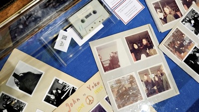 View of items at an auction of polariods and a cassette with the recording of Danish schoolboys' interviews with John Lennon and Yoko Ono during the couple's winter stay in Thy, Jutland, Denmark in 1970 at Bruun Rasmussen Auction House in Copenhagen, Denmark (Ritzau Scanpix/Philip Davali via REUTERS)