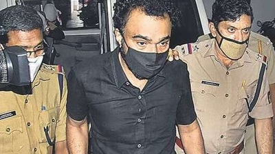 Monson Mavunkal in police custody on Tuesday. PTI Monson Mavunkal in police custody on Tuesday. PTI