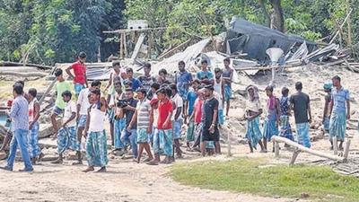 The Assam Human Rights Commission (AHRC) on Thursday asked the state government to give details on whether a probe has been ordered into last week’s violence during an eviction drive that claimed lives of two people in Darrang district. (PTI PHOTO.) The Assam Human Rights Commission (AHRC) on Thursday asked the state government to give details on whether a probe has been ordered into last week’s violence during an eviction drive that claimed lives of two people in Darrang district. (PTI PHOTO.)