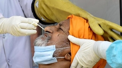 A man's sample being collected for a Covid-19 test. (HT Photo)