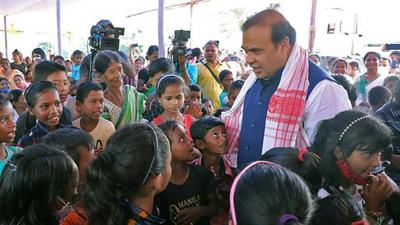 Assam Chief Minister Himanta Biswa Sarma meets children of an Anganwadi Kendra during his visit to Behali in Sonitpur on Wednesday. (ANI PHOTO.) Assam Chief Minister Himanta Biswa Sarma meets children of an Anganwadi Kendra during his visit to Behali in Sonitpur on Wednesday. (ANI PHOTO.)