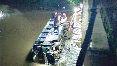 A Meghalaya Transport Corporation bus carrying 21 passengers and crew fell into the Ringdi river at Nongchram in Meghalaya. (Photo Courtesy- East Garo Hills police) A Meghalaya Transport Corporation bus carrying 21 passengers and crew fell into the Ringdi river at Nongchram in Meghalaya. (Photo Courtesy- East Garo Hills police)