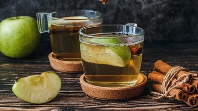 Apple Cider Vinegar: Another most common kitchen ingredient used to treat Gas pain and bloating is apple cider vinegar. You can add a tablespoon of it to a glass of water or your tea and sip on it to reduce symptoms. (Unsplash)