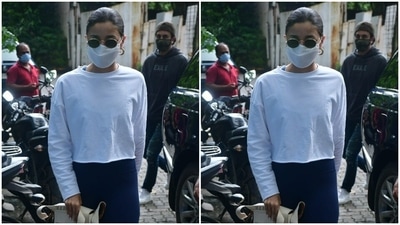 Alia’s summer fashion is always on point. The actor was snapped by paparazzi on her way to the construction site. For a day out in the sun, Alia chose a full-sleeved white cropped sweatshirt and matched them with black lowers. (HT Photos/Varinder Chawla)
