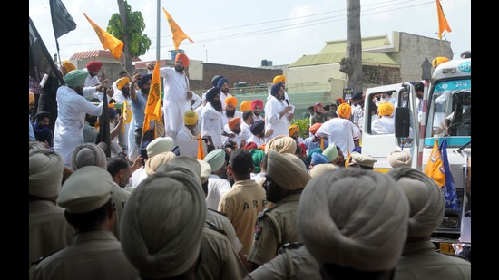 Shiromani Akali Dal workers during a protest march in Mohali on Wednesday. The SKM had asked Punjab’s ruling Congress, Shiromani Akali Dal and the Aam Aadmi Party to desist from holding political events till dates for the assembly polls are announced.