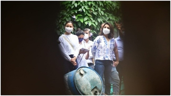 Neetu and Alia twinned in white and were spotted overlooking the construction site together.(HT Photos/Varinder Chawla)