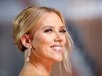 Scarlett Johansson poses on the red carpet during the Oscars arrivals at the 92nd Academy Awards in Hollywood.