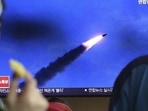 People watch a television screen showing an image of a missile test by North Korea (AP File Photo/Used only for representative purpose)