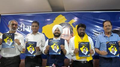 AAP leaders at the launch of party manifesto for MC elections in Chandigarh on Friday. (Ravi Kumar/HT)