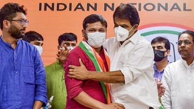 AICC General Secretary and MP KC Venugopal hugs new Congress member Kanhaiya Kumar, at AICC in New Delhi earlier this week. (PTI PHOTO) AICC General Secretary and MP KC Venugopal hugs new Congress member Kanhaiya Kumar, at AICC in New Delhi earlier this week. (PTI PHOTO)