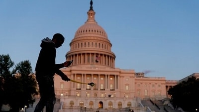 The bill passed both chambers after Democrats dropped an earlier attempt to attach a debt-ceiling suspension to the bill in face of implacable Republican opposition to that measure. (AP)