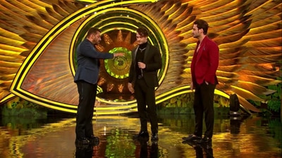 Bigg Boss 15 host Salman Khan with Asim Riaz and his brother Umar Riaz. Bigg Boss 15 host Salman Khan with Asim Riaz and his brother Umar Riaz.