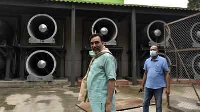 Delhi environment minister Gopal Rai visits the anti-smog tower at Baba Kharak Singh Marg, Connaught Palace, in New Delhi, on Friday. (Sanjeev Verma/HT PHOTO)
