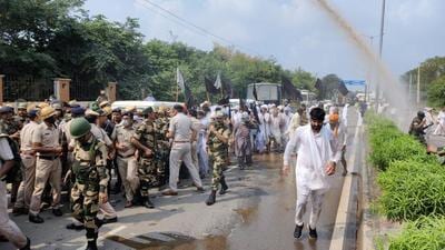 Haryana Police using water cannons to disperse farmers from protesting outside a college where deputy chief minister Dushyant Chautala was to attend a function in Jhajjar on Friday. (HT Photo) Haryana Police using water cannons to disperse farmers from protesting outside a college where deputy chief minister Dushyant Chautala was to attend a function in Jhajjar on Friday. (HT Photo)