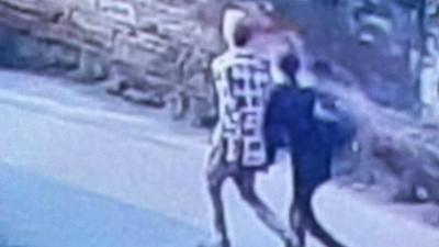 A CCTV camera installed outside the woman’s house in Indira Colony of Ludhiana, showed the two robbers leaving with the valuables after the crime. The men had tied up the woman with a rope and held her hostage in the bathroom during the crime. (HT PHOTO)