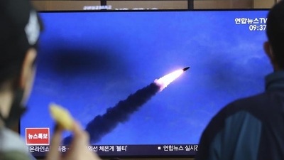 People watch a television screen showing an image of a missile test by North Korea (AP File Photo/Used only for representative purpose)