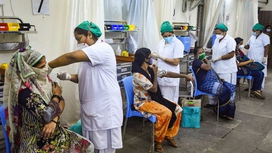 Beneficiaries receive Covid-19 vaccines in Mumbai.(PTI)