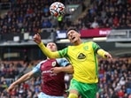 Burnley's Johann Berg Gudmundsson in action with Norwich City's Dimitris Giannoulis