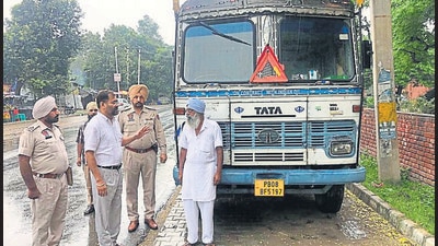 On being questioned, the staffer said he was simply following orders as he had been asked him to water the plants everyday; his seniors said it had suddenly started to rain in Ludhiana when the official crossed by. (HT Photo) On being questioned, the staffer said he was simply following orders as he had been asked him to water the plants everyday; his seniors said it had suddenly started to rain in Ludhiana when the official crossed by. (HT Photo)
