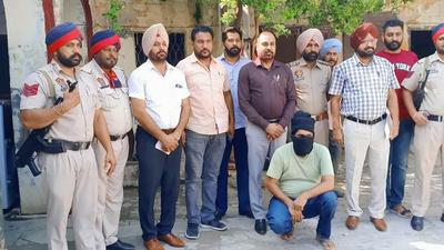 Faridkot police say the accused Bhola (face covered) had previously too entered Shakti’s house to kill him; Shakti is an accused in the Bargari sacrilege in Punjab of 2015. (HT Photo) Faridkot police say the accused Bhola (face covered) had previously too entered Shakti’s house to kill him; Shakti is an accused in the Bargari sacrilege in Punjab of 2015. (HT Photo)