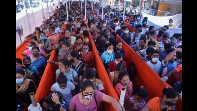 People wait for vaccination against Covid at a Thane Municipal Corporation centre in Diva on Saturday. (PRAFUL GANGURDE/HT PHOTO) People wait for vaccination against Covid at a Thane Municipal Corporation centre in Diva on Saturday. (PRAFUL GANGURDE/HT PHOTO)