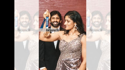 Sangeeta, 23, and Bajrang, 27, married in November 2020. But they have pretty much been kept apart since then, first because Bajrang was training hard for the Olympics, and then because of the felicitation ceremonies he has had to attend since returning from Tokyo with an Olympic medal; Styling: Avneet Chadha; Art direction: Amit Malik; Assistant styling: Tanya Aggarwal; Make-up and hair: Artistry by Anjali Jain; Location courtesy: Hilton Garden Inn New Delhi/Saket; On Bajrang: Pants & blazer: Raymonds; Shirt: Park Avenue; Shoes: Bata; On Sangeeta: Gown: Dolly J; Earrings: Soni sapphire; Heels: Bata (Hari Nair) Sangeeta, 23, and Bajrang, 27, married in November 2020. But they have pretty much been kept apart since then, first because Bajrang was training hard for the Olympics, and then because of the felicitation ceremonies he has had to attend since returning from Tokyo with an Olympic medal; Styling: Avneet Chadha; Art direction: Amit Malik; Assistant styling: Tanya Aggarwal; Make-up and hair: Artistry by Anjali Jain; Location courtesy: Hilton Garden Inn New Delhi/Saket; On Bajrang: Pants & blazer: Raymonds; Shirt: Park Avenue; Shoes: Bata; On Sangeeta: Gown: Dolly J; Earrings: Soni sapphire; Heels: Bata (Hari Nair)