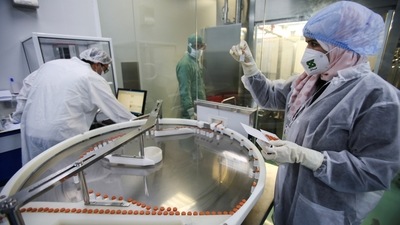 The government aims to vaccinate every adult by December 2021. (Ramzi Boudina / REUTERS)