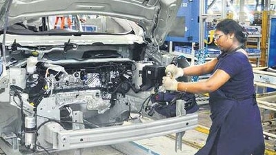 The manufacturing PMI rose from 52.3 in August to 53.7 in September. AFP The manufacturing PMI rose from 52.3 in August to 53.7 in September. AFP