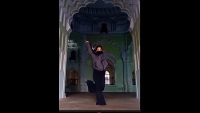 In the 30-second video that went viral, a girl in black attire, wearing a mask, was seen dancing inside the Bada Imambada . (Sourced) In the 30-second video that went viral, a girl in black attire, wearing a mask, was seen dancing inside the Bada Imambada . (Sourced)