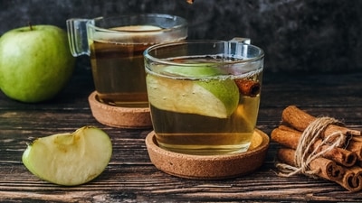 Vinegar Foot Soak: You can neutralise the odour of your feet by soaking them in warm water. Add 1/3 a cup of apple cider vinegar and soak your feet for 15 minutes. (Unsplash)