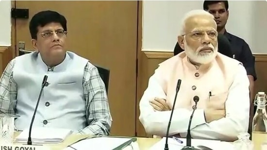 Commerce minister Piyush Goyal with PM Modi. Commerce minister Piyush Goyal with PM Modi.